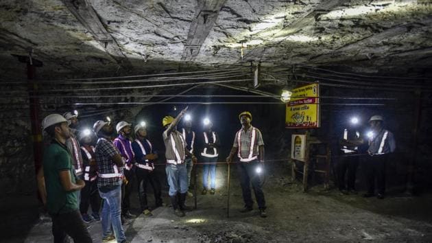 Temperatures underground can range from 5° Celsius to 30° Celsius, depending on the weather. Here, WCL ventilation officer PS Bhadke explains how a convergence recorder monitors the pressure on the roof of the mine. It uses a colour-code system to signal when the roof is either weakening from below or under too much pressure from above. Green means it’s safe, yellow is a sign that you need to reinforce this patch, while red means it is unsafe and needs immediate repairs. (Kunal Patil / HT Photo) Temperatures underground can range from 5° Celsius to 30° Celsius, depending on the weather. Here, WCL ventilation officer PS Bhadke explains how a convergence recorder monitors the pressure on the roof of the mine. It uses a colour-code system to signal when the roof is either weakening from below or under too much pressure from above. Green means it’s safe, yellow is a sign that you need to reinforce this patch, while red means it is unsafe and needs immediate repairs. (Kunal Patil / HT Photo)
