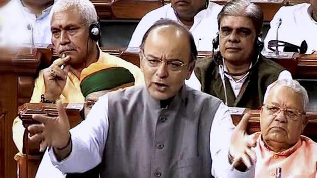 Union finance minister Arun Jaitley speaks in the Lok Sabha in New Delhi on Thursday. The Lok Sabha rejected five amendments moved by the Rajya Sabha to pass the finance bill on Thursday. (PTI Photo) Union finance minister Arun Jaitley speaks in the Lok Sabha in New Delhi on Thursday. The Lok Sabha rejected five amendments moved by the Rajya Sabha to pass the finance bill on Thursday. (PTI Photo)