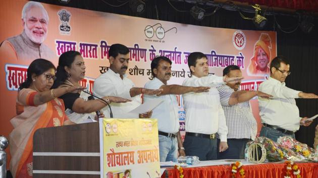 Village officials took an oath to provide a clean environment for residents at a felicitation event in Ghaziabad on Friday.(SAKIB ALI/HT) Village officials took an oath to provide a clean environment for residents at a felicitation event in Ghaziabad on Friday.(SAKIB ALI/HT)
