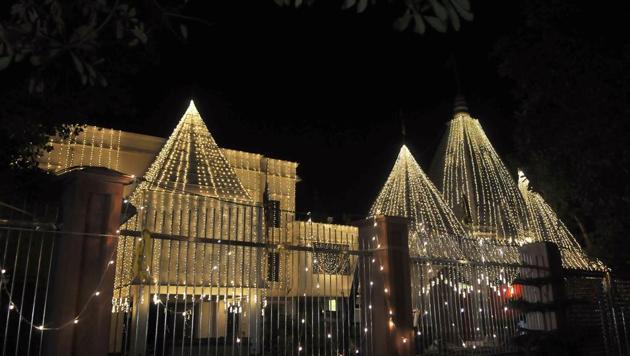 An illuminated temple on the occasion of Navratri festival at Sarabha Nagar in Ludhiana. (Gurminder Singh/HT)