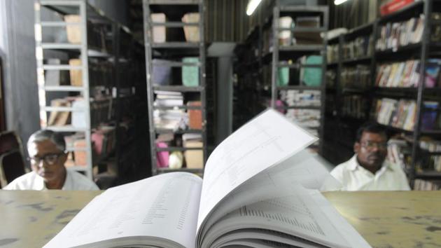 Ironically, books on competitive exams are keeping alive the trickle of readers to these once-grand repositories of knowledge. (Samir Jana/HT PHOTO)
