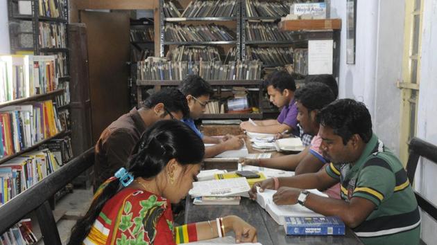 The Midnapore library has two staff members instead of four and at least five thousand books from its collections, including rare and old ones, have been damaged due to lack of maintenance. (Samir Jana/HT PHOTO)