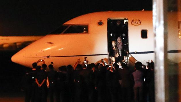 One of the Malaysians who was stranded in Pyongyang walks down from a plane after arriving at Kuala Lumpur International airport in Sepang, Malaysia, on March 31, 2017. (AP Photo) One of the Malaysians who was stranded in Pyongyang walks down from a plane after arriving at Kuala Lumpur International airport in Sepang, Malaysia, on March 31, 2017. (AP Photo)
