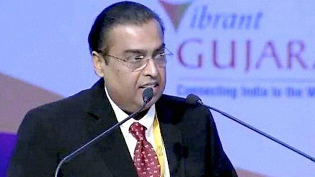 Mukesh Ambani Chairman of the RIL group of Industries addresses the gathering at the 4 days long 8th edition of the vibrant global Gujarat summit.(PTI)