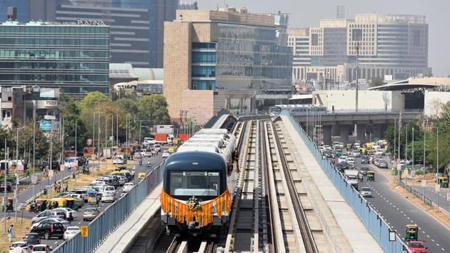 The line opened at 3.10pm to the public on Friday from the DLF Phase-1 Metro station, with over 30 passengers on board.(Sanjeev Verma/HT PHOTO)