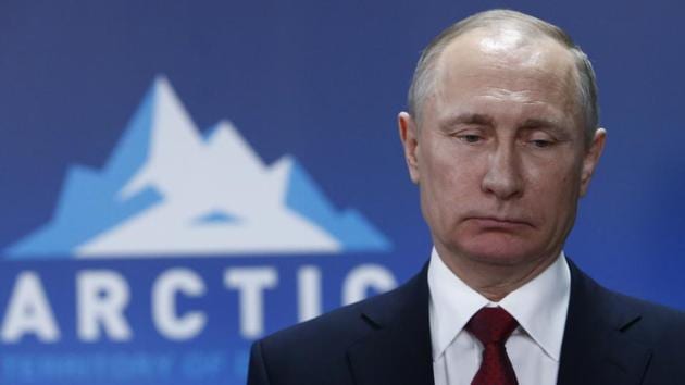 Russian President Vladimir Putin looks on after a meeting with President of Iceland Gudni Johannesson at sidewalks of the International Arctic Forum in Arkhangelsk in Russia on Thursday. (AP Photo) Russian President Vladimir Putin looks on after a meeting with President of Iceland Gudni Johannesson at sidewalks of the International Arctic Forum in Arkhangelsk in Russia on Thursday. (AP Photo)