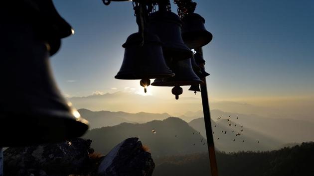 Sunset above Rudraprayag, at the Kartik Swami Temple where after evening prayers bells ringing can be heard from afar. (Gurinder Osan/HT Photo)