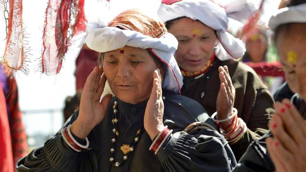 Village womenfolk seek blessings as they offer prayers to the almighty. (Gurinder Osan/HT Photo)
