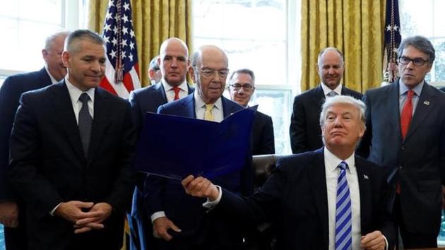 US President Donald Trump smiles after announcing a permit for TransCanada Corp's Keystone XL oil pipeline in the Oval Office of the White House in Washington,on March 24. (Reuters Photo) US President Donald Trump smiles after announcing a permit for TransCanada Corp's Keystone XL oil pipeline in the Oval Office of the White House in Washington,on March 24. (Reuters Photo)