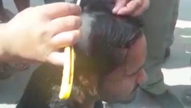 An anti-Romeo squad shaved the head of a man who was with his female friend in Shahjahanpur.(Video screengrab)