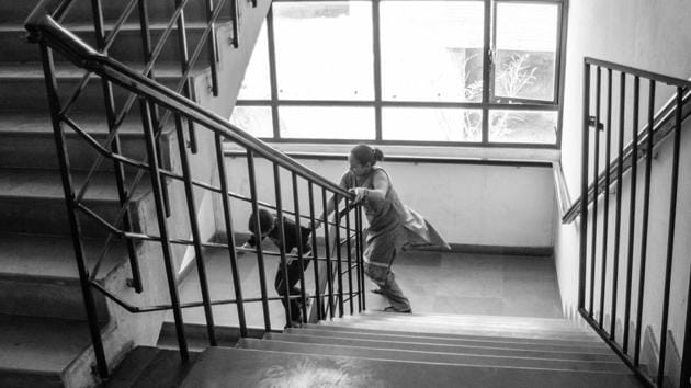 Piyush being chased by his mother as he runs away from a playing session. His mother works at an NGO and many like her who work in such organizations are parents and relatives of autistic individuals and have first hand experience of dealing with them, making them great assets. (Vageesh Lall/ HT Photo)