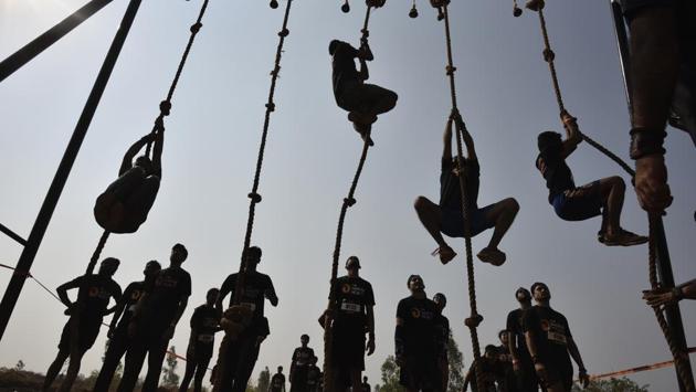 There were three categories of participants. First category - The Phoenix Project was for participants above 18 years of age. They ran a course of 5 km with 20 plus obstacles. (Arijit Sen/HT Photo)