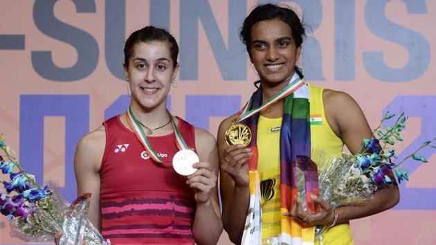 PV Sindhu (R) defeated Carolina Marin to win the India Open title in New Delhi on Sunday. (AFP) PV Sindhu (R) defeated Carolina Marin to win the India Open title in New Delhi on Sunday. (AFP)