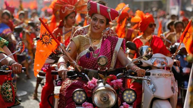 Women dressed in traditional costumes ride motorbikes as they attend celebrations to mark the Gudi Padwa festival, the beginning of the New Year for Maharashtrians, in Mumbai, India on March 28, 2017. (Shailesh Andrade/REUTERS)