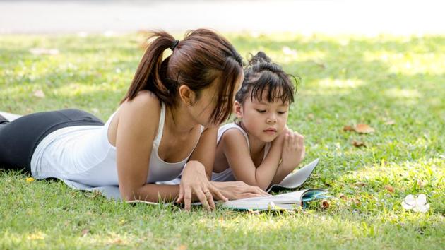 Encouraging kids to read has many psychological, health and linguistic benefits, say researchers.(Shutterstock)