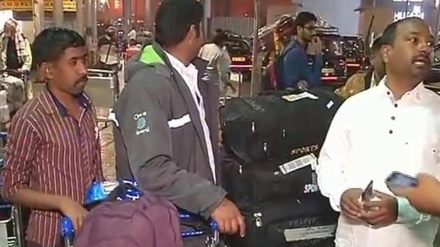 Indians who were rescued from Iraq arrive at Indira Gandhi Airport in New Delhi on Monday.(ANI)