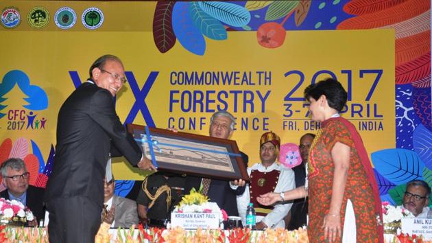 Indian Council of Forestry Research and Education DG Suresh C Gairola (L) and Forest Research Institute director Savita (R) present a memento to Governor KK Paul at Commonwealth Forestry Conference in Dehradun on Monday. (Vinay Santosh Kumar/HT Photo) Indian Council of Forestry Research and Education DG Suresh C Gairola (L) and Forest Research Institute director Savita (R) present a memento to Governor KK Paul at Commonwealth Forestry Conference in Dehradun on Monday. (Vinay Santosh Kumar/HT Photo)
