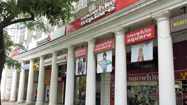 Snowhite retail clothing shop has been in D block, Outer Circle for many years now even though the shops around it have changed. (anmol wahi/HT Photo) 