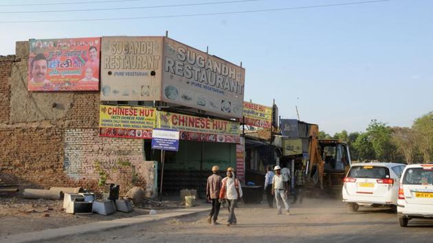 The petitioners, including Sugand restaurant, were demanding alternative plots in lieu of the land that Huda wanted to acquire from them.(Parveen Kumar/HT Photo) The petitioners, including Sugand restaurant, were demanding alternative plots in lieu of the land that Huda wanted to acquire from them.(Parveen Kumar/HT Photo)