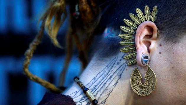 An earring of a tattoo artist is pictured during the Tattoo Convention in Kathmandu. (Navesh Chitrakar / Reuters)