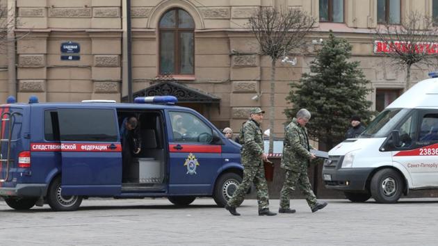Members of security services walk past a vehicle of Russia's Investigative Committee outside Sennaya Ploshchad metro station after an explosion. At least 10 people were killed in a blast on a metro train in the Russian city of St Petersburg on Monday. (Igor Russak/REUTERS) Members of security services walk past a vehicle of Russia's Investigative Committee outside Sennaya Ploshchad metro station after an explosion. At least 10 people were killed in a blast on a metro train in the Russian city of St Petersburg on Monday. (Igor Russak/REUTERS)