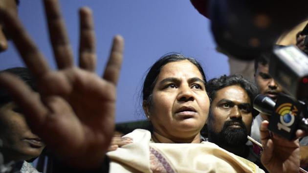 Rohith Vemula's mother Radhika Vemula detained by Delhi Police during the candle march in New Delhi, February 24(Ravi Choudhary/HT Photo)