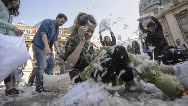 Many Romanians gathered in the centre of the capital city to take part in the pillow fight to mark International Pillow Fight Day. (Andreea Alexandru / AP)