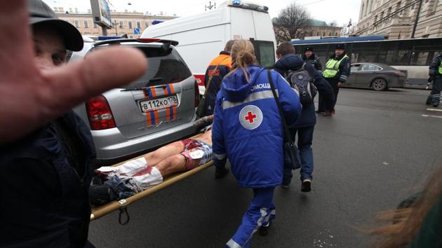 Paramedics carry a subway blast victim into an ambulance after the explosion. (AP) Paramedics carry a subway blast victim into an ambulance after the explosion. (AP)