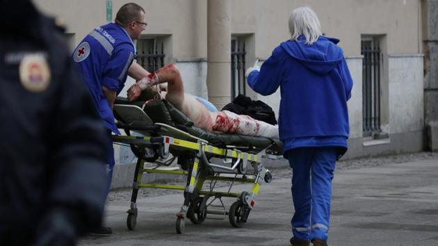 An injured person is helped by emergency services outside Sennaya Ploshchad metro station. Surveillance cameras in St Petersburg’s metro system may have captured images of the person suspected of organising Monday’s deadly train blast, Russian news agency Interfax quoted a source as saying. (Anton Vaganov/REUTERS) An injured person is helped by emergency services outside Sennaya Ploshchad metro station. Surveillance cameras in St Petersburg’s metro system may have captured images of the person suspected of organising Monday’s deadly train blast, Russian news agency Interfax quoted a source as saying. (Anton Vaganov/REUTERS)