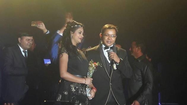 The kingping of Noida ponzi scheme Anubhav Mittal (right) with his wife Ayushi at a party. Mittal’s wife and his father have been made accused in the case by UP Police’s special task force which is investigating the case.(Handout) The kingping of Noida ponzi scheme Anubhav Mittal (right) with his wife Ayushi at a party. Mittal’s wife and his father have been made accused in the case by UP Police’s special task force which is investigating the case.(Handout)