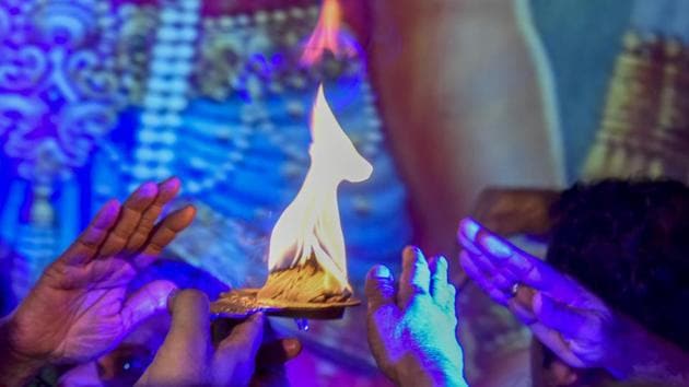 The arti being offered to the lord. (Kunal Patil/HT Photo) 
