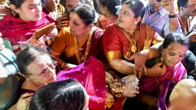 The idol being taken for the puja. (Kunal Patil/HT Photo) 
