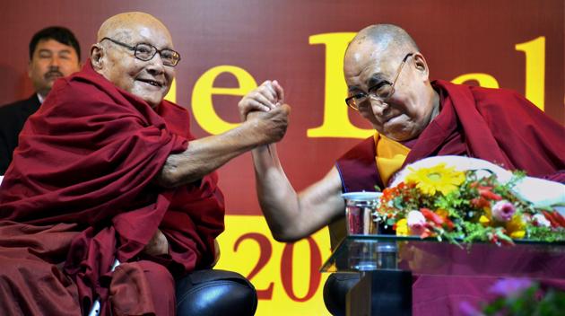 Tibetan Spiritual leader Dalai Lama with a Monk at Dibrugarh University in Dibrugarh . (PTI)