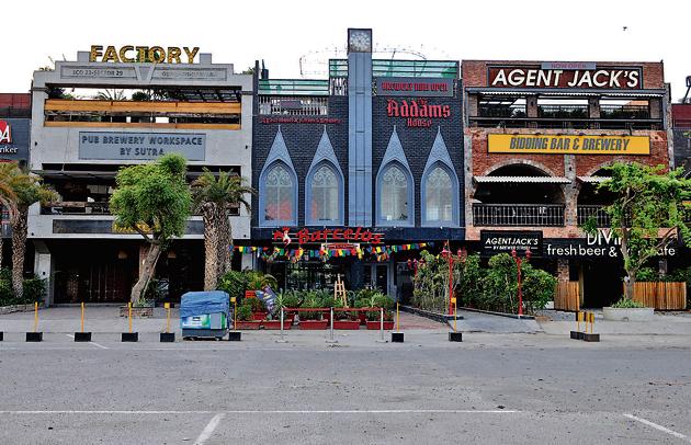 According to owners and managers bars and pubs, hardly anybody visits just to eat and their businesses survived largely on liquor. They also reported a drop in sales due to lower footfall.(Parveen Kumar/HT Photo) According to owners and managers bars and pubs, hardly anybody visits just to eat and their businesses survived largely on liquor. They also reported a drop in sales due to lower footfall.(Parveen Kumar/HT Photo)