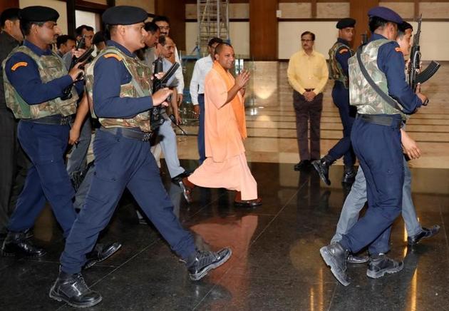 Chief minister Yogi Adityanath arrives to attend his first cabinet meeting at Lok Bhavan in Lucknow last week(Reuters Photo)