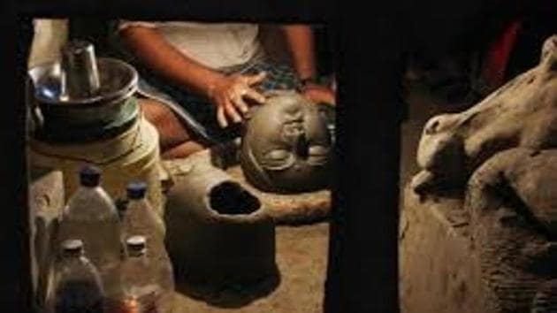 Kumortuli, in north Kolkata, is the nursery and cradle where hundreds of artisans make and export the famous Durga idols.(HT Photo) Kumortuli, in north Kolkata, is the nursery and cradle where hundreds of artisans make and export the famous Durga idols.(HT Photo)