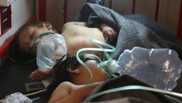 Syrian children receive treatment at a small hospital in the town of Maaret al-Noman following a suspected toxic gas attack in Khan Sheikhun, a nearby rebel-held town in Syria’s northwestern Idlib province. (Mohamed al-Bakour / AFP)
