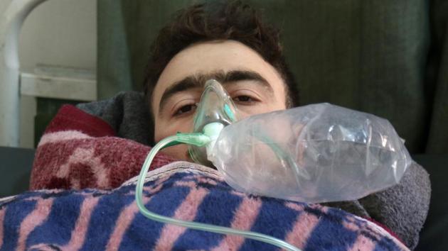 A Syrian man receives treatment at a small hospital in the town of Maaret al-Noman following a suspected toxic gas attack in Khan Sheikhun, a nearby rebel-held town in Syria’s northwestern Idlib province. (Mohamed al-Bakour / AFP)