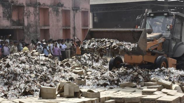Bottles of country liquor being destroyed on the outskirts of Patna.(AP Dube/ HT File) Bottles of country liquor being destroyed on the outskirts of Patna.(AP Dube/ HT File)