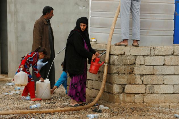Hammam al-Alil, a town south of Mosul once famous throughout Iraq for its healing hot waters, is back in business after a U.S.-backed offensive retook the area from Islamic State militants and authorities reopened its spa.Residents have been flocking back since Islamic State was expelled from the town in early November, ending the days when bathers had to wear a tunic covering them from knee to navel as part of the Sunni Muslim movement’s strict modesty code. (Suhaib Salem / REUTERS) 