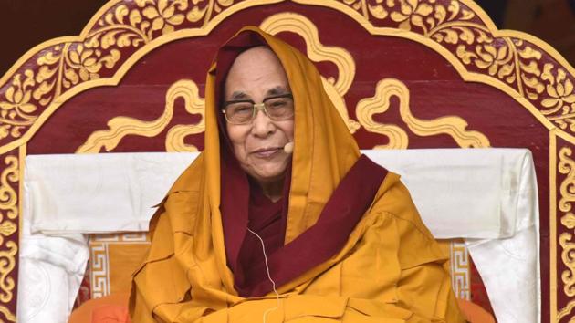 Tibetan spiritual leader the Dalai Lama delivers religious teachings to Buddhist followers at the Buddha Stadium in Bomdila in Arunachal Pradesh.(AFP Photo)