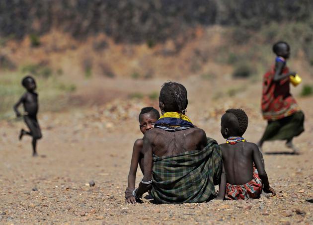 As the drought bites, the road ahead looks longer than ever for Turkana: some 92 percent of its 1.4 million people live below the poverty line and only a fifth know how to read and write, a figure four times lower than the national average. Three million people are in need of emergency humanitarian assistance, and, while the response has been more effective than the last time, in 2011, still more needs to be done, aid workers say. (TONY KARUMBA / AFP) As the drought bites, the road ahead looks longer than ever for Turkana: some 92 percent of its 1.4 million people live below the poverty line and only a fifth know how to read and write, a figure four times lower than the national average. Three million people are in need of emergency humanitarian assistance, and, while the response has been more effective than the last time, in 2011, still more needs to be done, aid workers say. (TONY KARUMBA / AFP)