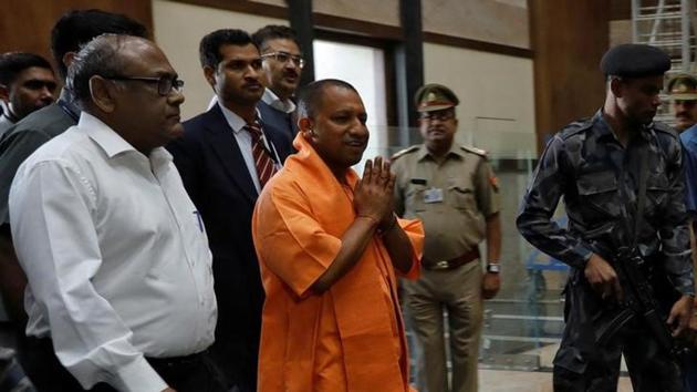 Yogi Adityanath, newly appointed chief minister of Uttar Pradesh, arrives to attend a meeting with government officials at Lok Bhavan in Lucknow on March 20.(Reuters)