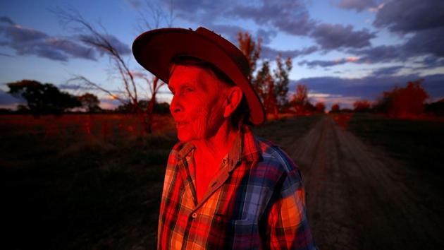 May McKeown watches the sunset on her 6000 acre (2400 hectare) property of 'Long View' near the town of Come-by-Chance, located over 700 kilometres north-west of Sydney in Australia. McKeown, aged 78, lives and works on her property mostly alone as her son is constantly travelling. She daily inspects the property and hand-feeds her cattle, writing poems in her spare time about her lonely life on the flat north-west plains. (David Gray/REUTERS) May McKeown watches the sunset on her 6000 acre (2400 hectare) property of 'Long View' near the town of Come-by-Chance, located over 700 kilometres north-west of Sydney in Australia. McKeown, aged 78, lives and works on her property mostly alone as her son is constantly travelling. She daily inspects the property and hand-feeds her cattle, writing poems in her spare time about her lonely life on the flat north-west plains. (David Gray/REUTERS)