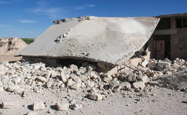 A picture taken on April 4, 2017 shows a destroyed motorcycle garage formerly used by paramedics at a hospital in Khan Sheikhun, a rebel-held town in the northwestern Syrian Idlib province, following a suspected toxic gas attack. A suspected chemical attack killed dozens of civilians including several children in rebel-held northwestern Syria, a monitor said, with the opposition accusing the government and demanding a UN investigation. (Omar haj kadour / AFP)