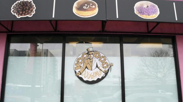 Images of the baked goods available adorn the windows of the storefront of Voodoo Doughnuts on East Colfax Avenue in Denver on Tuesday.(AP Photo) Images of the baked goods available adorn the windows of the storefront of Voodoo Doughnuts on East Colfax Avenue in Denver on Tuesday.(AP Photo)