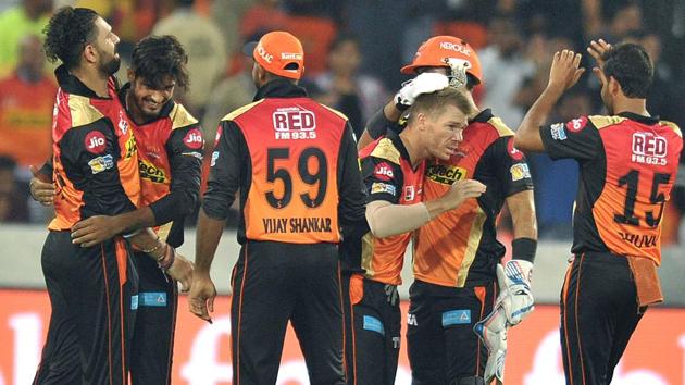 Sunrisers Hyderabad captain David Warner (C) celebrates after his team’s victory. (AFP)