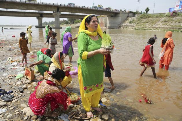 Rivers in India are worshipped as holy places by millions of pilgrims. But due to certain rituals and practices, pilgrimages have become on of the major causes of river pollution in India. (hanni Anand / AP)