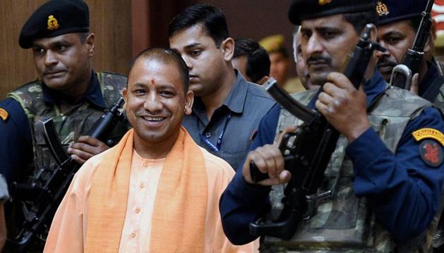 UP chief minister Yogi Adityanath comes out after a cabinet meeting at Lok Bhawan in Lucknow.(PTI)