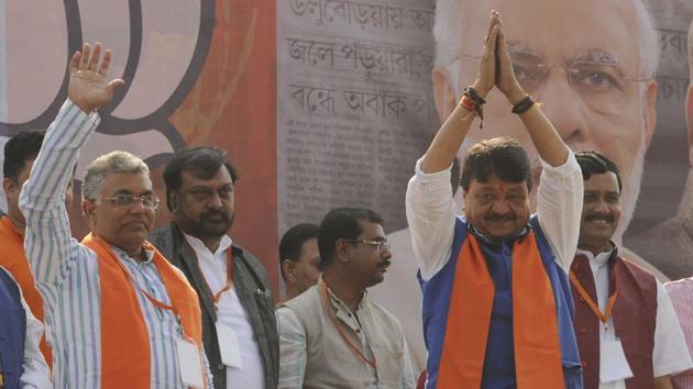 Bengal BJP president Dilip Ghosh (one hand raised) is a former RSS pracharak and is known as a hardliner. (HT Photo) Bengal BJP president Dilip Ghosh (one hand raised) is a former RSS pracharak and is known as a hardliner. (HT Photo)